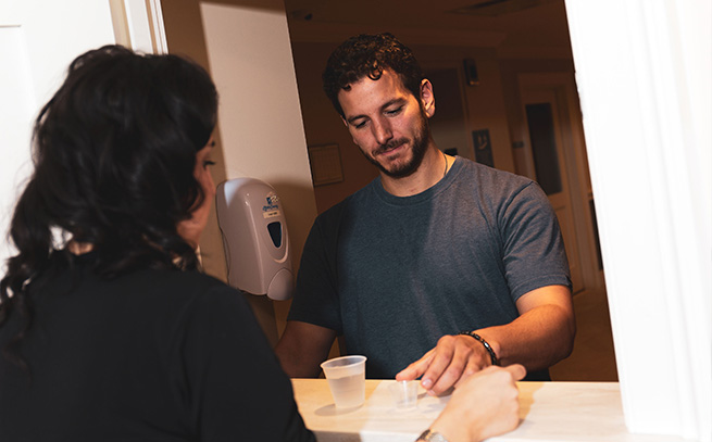 patient with a nurse getting medications in Orlando